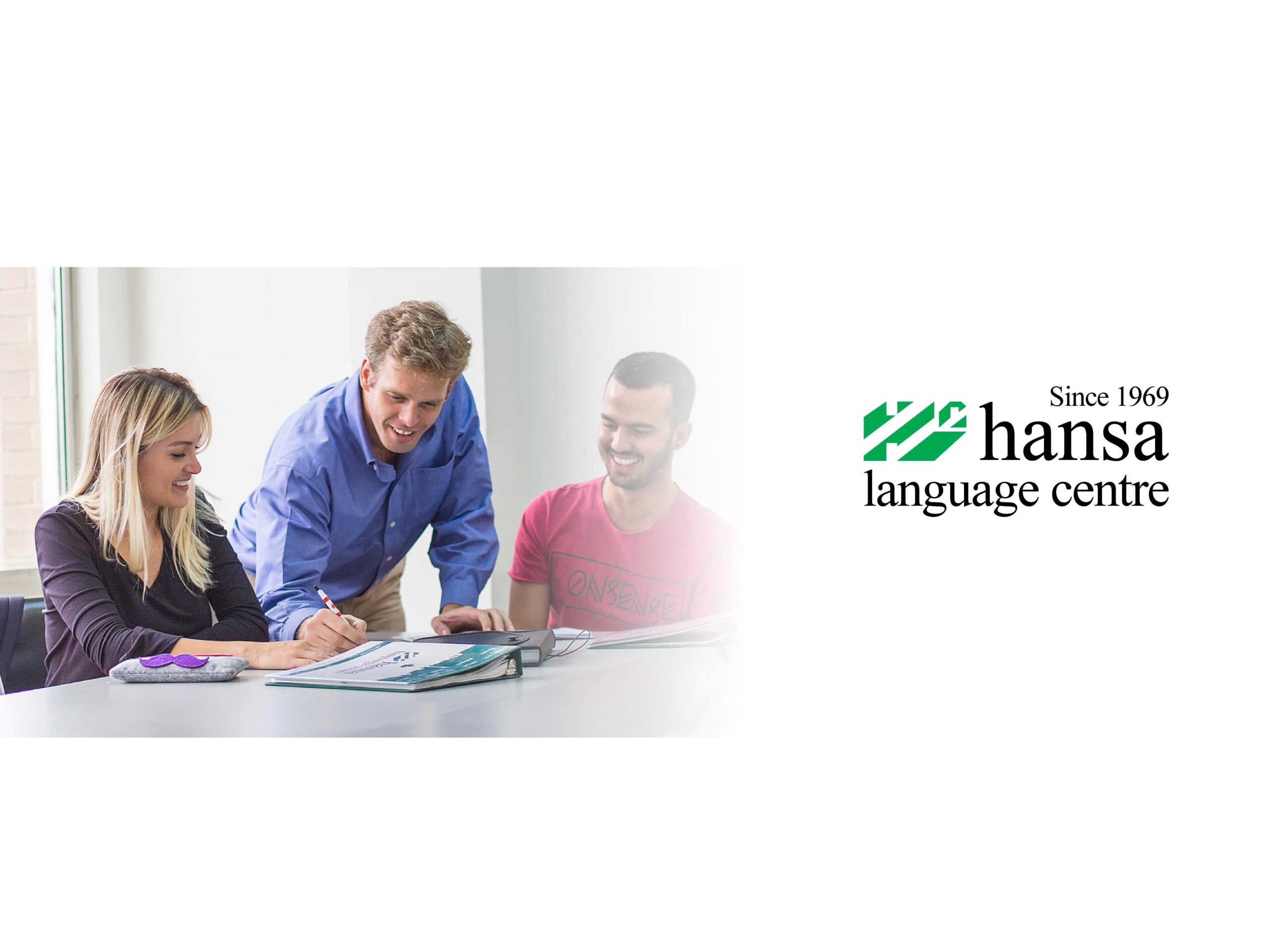 Hansa Language Centre logo & Hansa teacher with Hansa students in a classroom